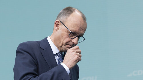 BERLIN, GERMANY - FEBRUARY 24: Friedrich Merz, chancellor candidate of Germany’s Christian Democrats (CDU/CSU), leaves after the press conference the day after German parliamentary elections on February 24, 2025 in Berlin, Germany. The CDU/CSU won with 28.5% and will seek to form a government coalition. (Photo by Maja Hitij/Getty Images)