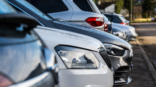 a row of parked cars