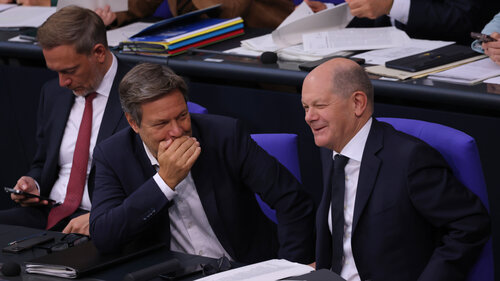 BERLIN, GERMANY - OCTOBER 19: (L-R) German Finance Minister Christian Lindner, Economy and Climate Action Minister Robert Habeck and Chancellor Olaf Scholz attend debates at the Bundestag after Scholz gave a government declaration prior to an upcoming summit of the European Council on October 19, 2023 in Berlin, Germany. Scholz addressed issues including the current conflict between Hamas and Israel, the war in Ukraine and migration. (Photo by Sean Gallup/Getty Images)
